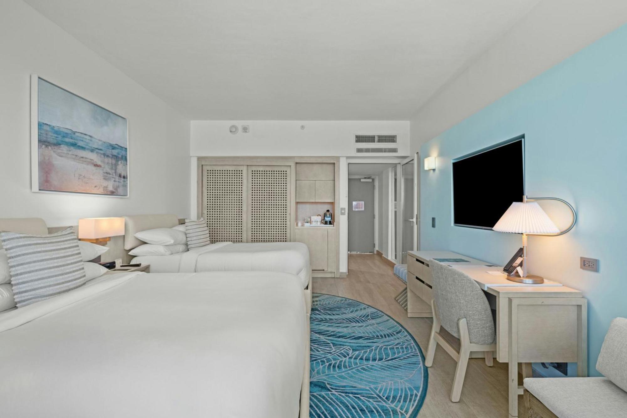Habitación Doble Deluxe con vistas al mar - 2 camas dobles