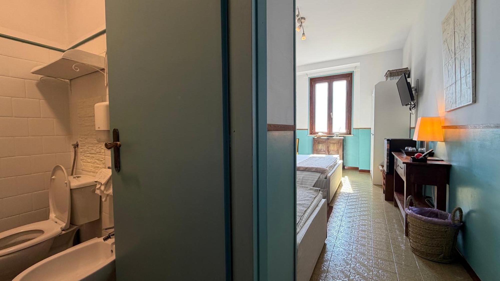 Dreibettzimmer mit Meerblick
