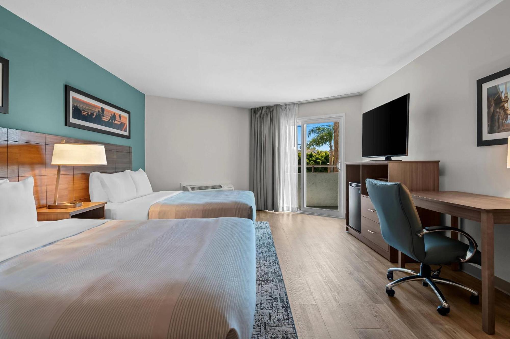 Kamer met 2 Queensize Bedden - Rookvrij
