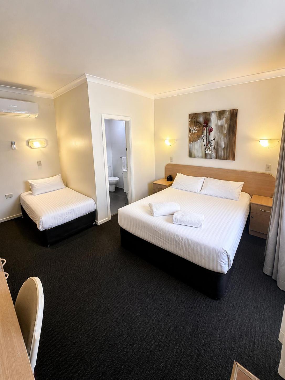 Standard Room with One Queen and One Single Bed