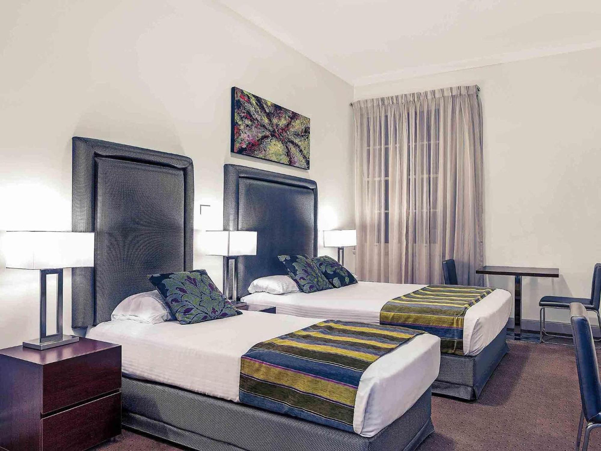 Standard Room with One Queen Bed and One Single Bed