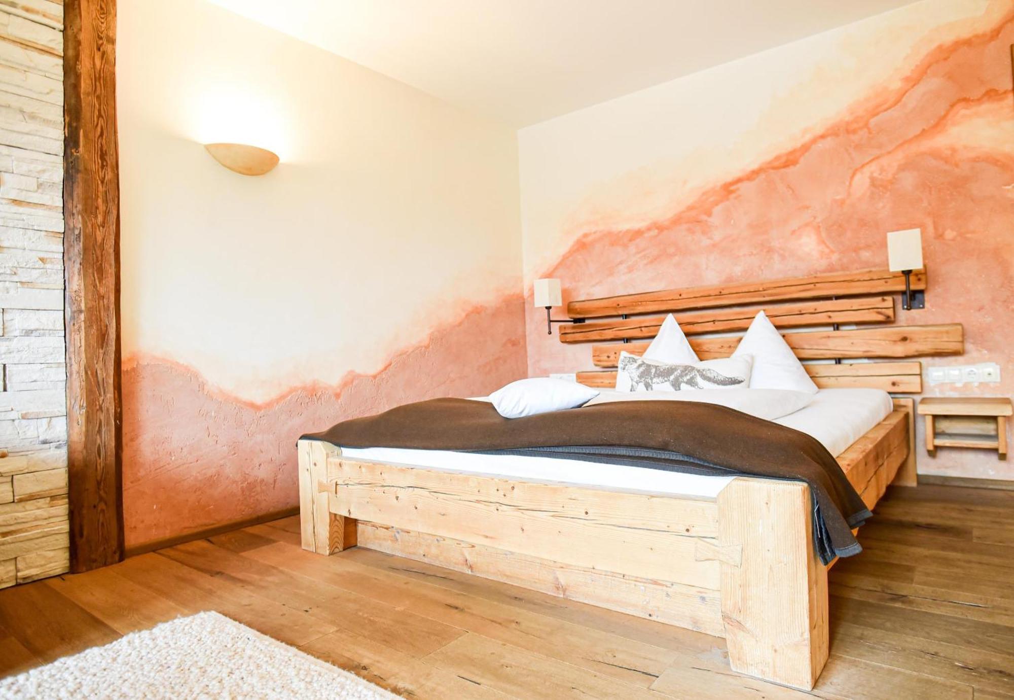 Two-Bedroom Family Room with One Double and One Bunk Bed, Balcony, Mountain View and Cozy Sitting Corner