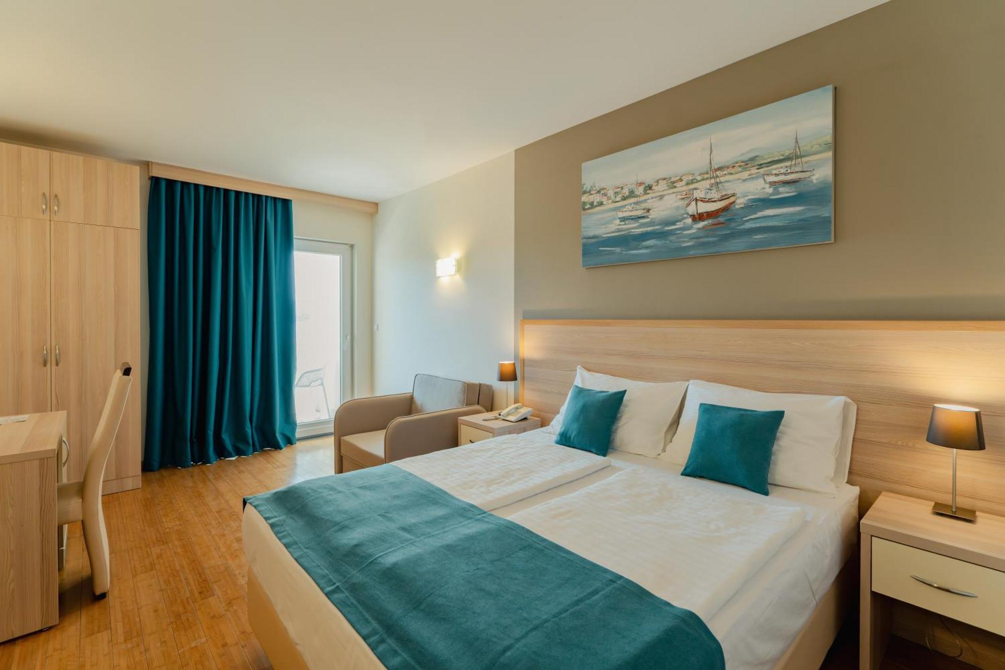Habitación Doble Deluxe con balcón y vistas al mar