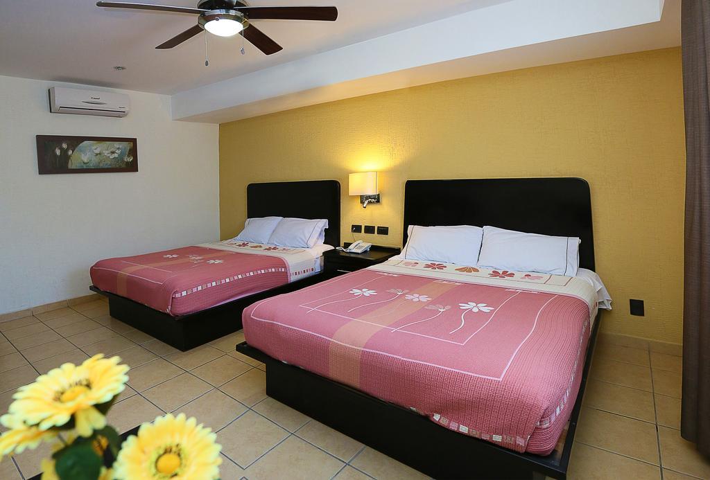 Habitación con 2 camas grandes