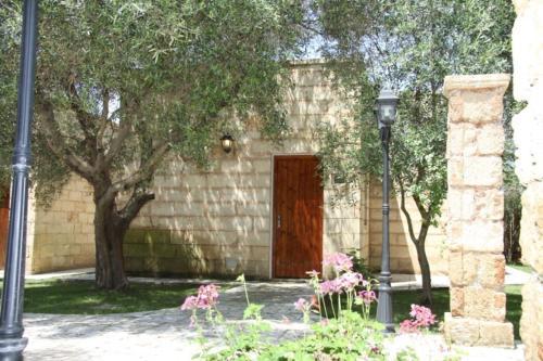 Camera Familiare con Vista Giardino