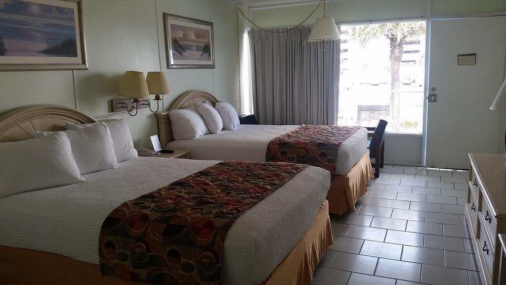 Deluxe Queen Room with Two Queen Beds and Pool View