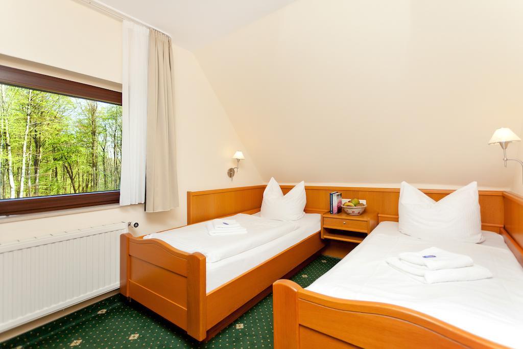 Doppel- oder Zweibettzimmer