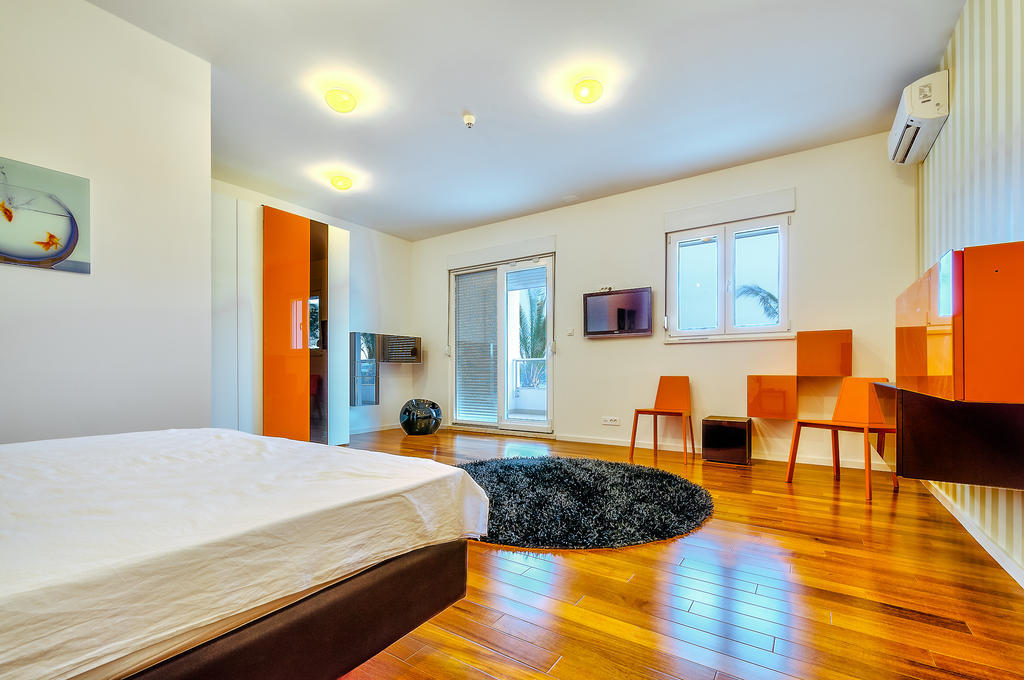 Deluxe Triple Room with Balcony and Sea View