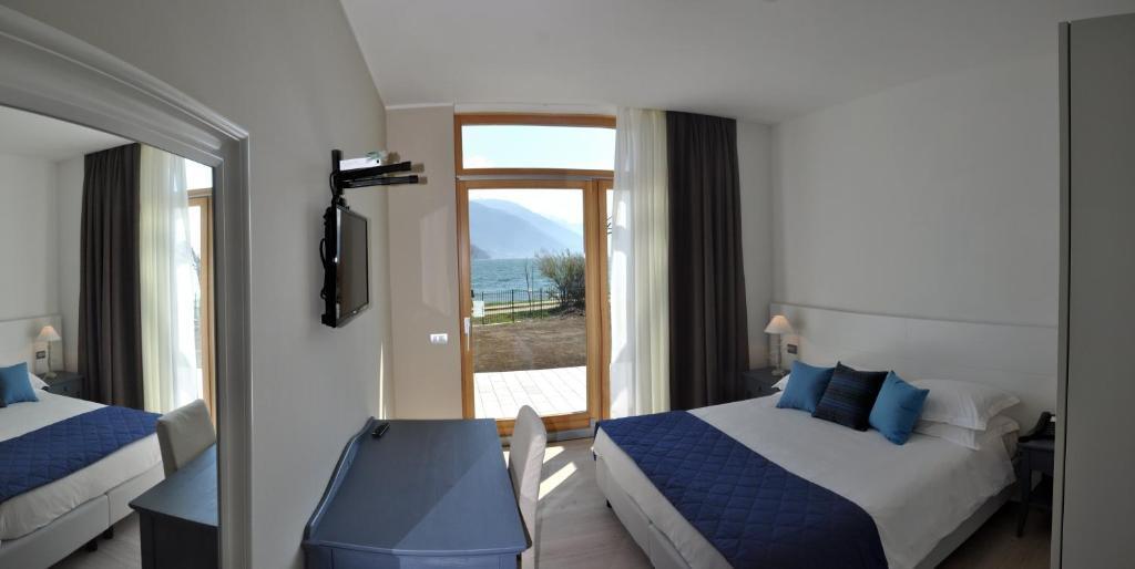 Superior Tweepersoonskamer met 1 of 2 Bedden - Vooraanzicht op het Meer