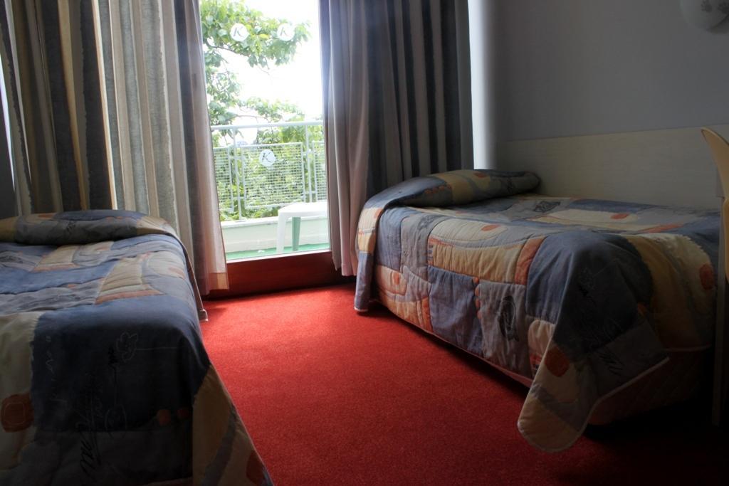Habitación Cuádruple con balcón (4 adultos)