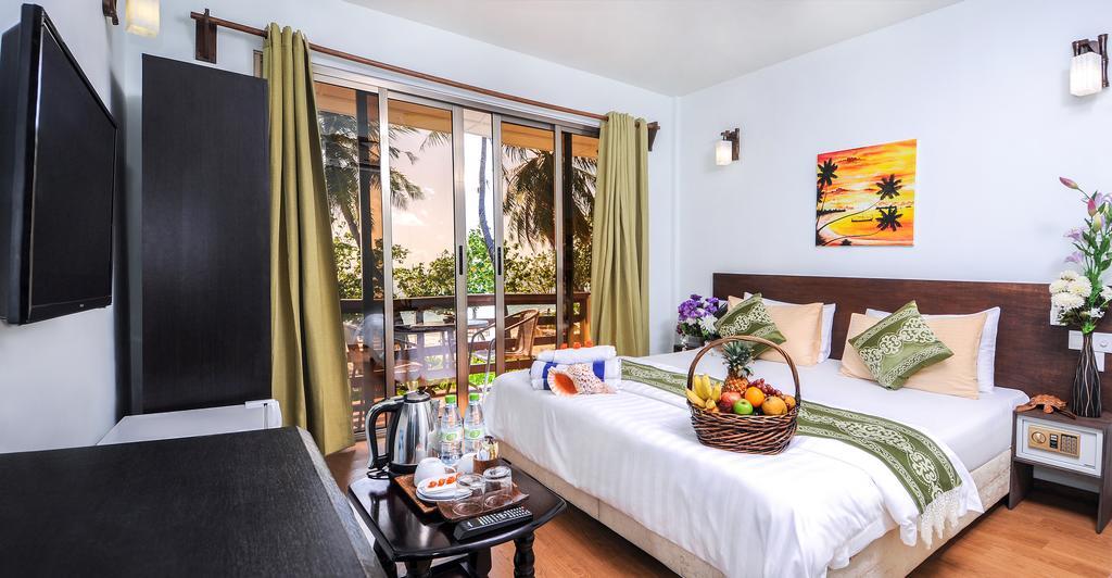 Deluxe tweepersoonskamer met balkon en uitzicht op zee