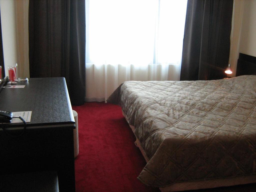 Doppel- oder Zweibettzimmer