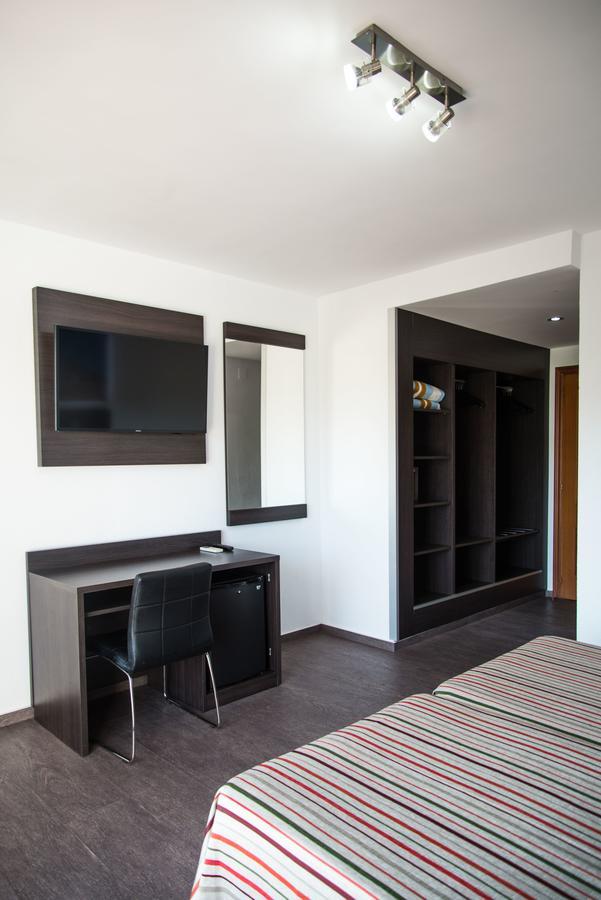 Habitación Cuádruple (2 adultos + 2 niños)