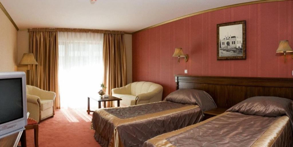 Doppel-/Zweibettzimmer mit seitlichem Meerblick