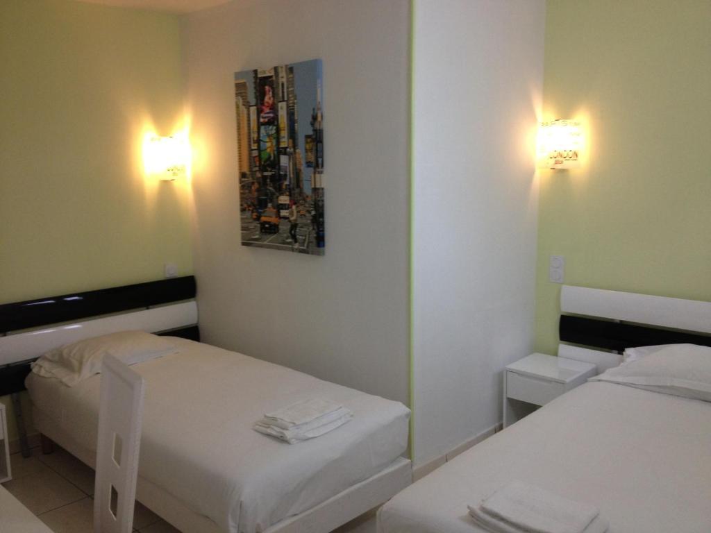 Tweepersoonskamer met 2 Aparte Bedden