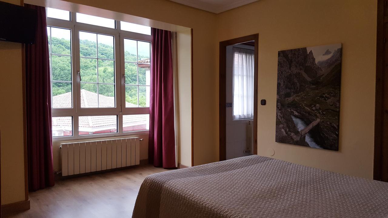 Quarto Queen Deluxe