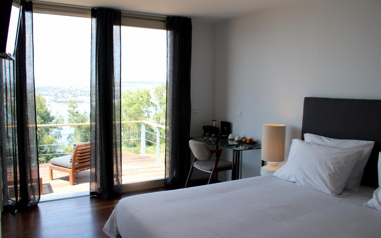 Quarto Duplo com Varanda e Vista do Rio
