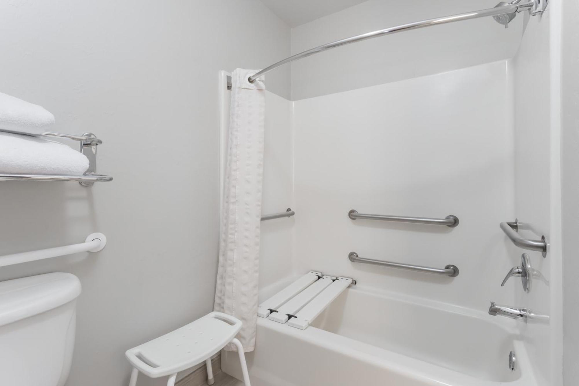 King Room with One King Bed and Bathtub with Grab Bars - Pool View - Accessible - Non-Smoking
