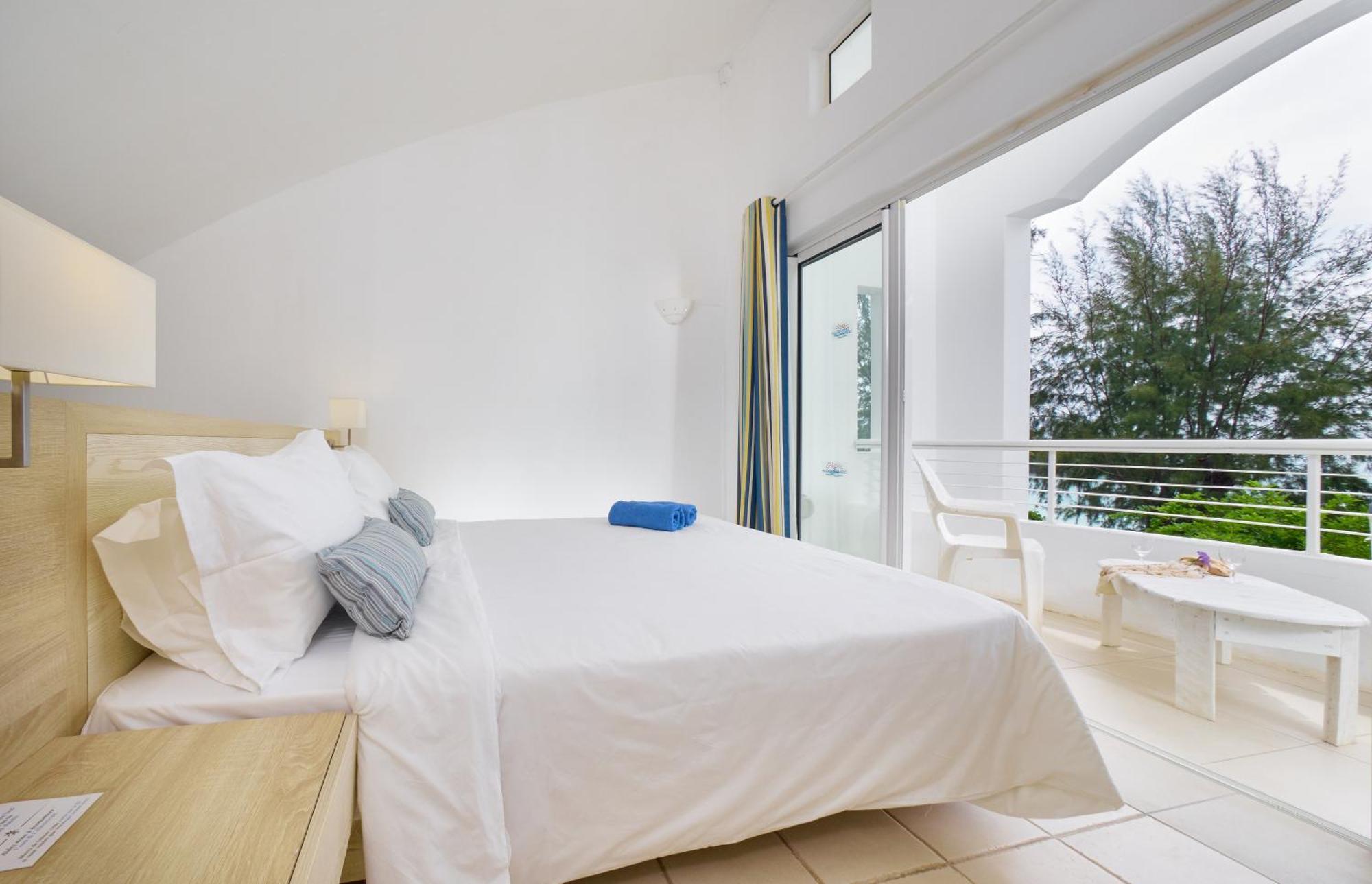 One-Bedroom Loft Partial Sea Garden View
