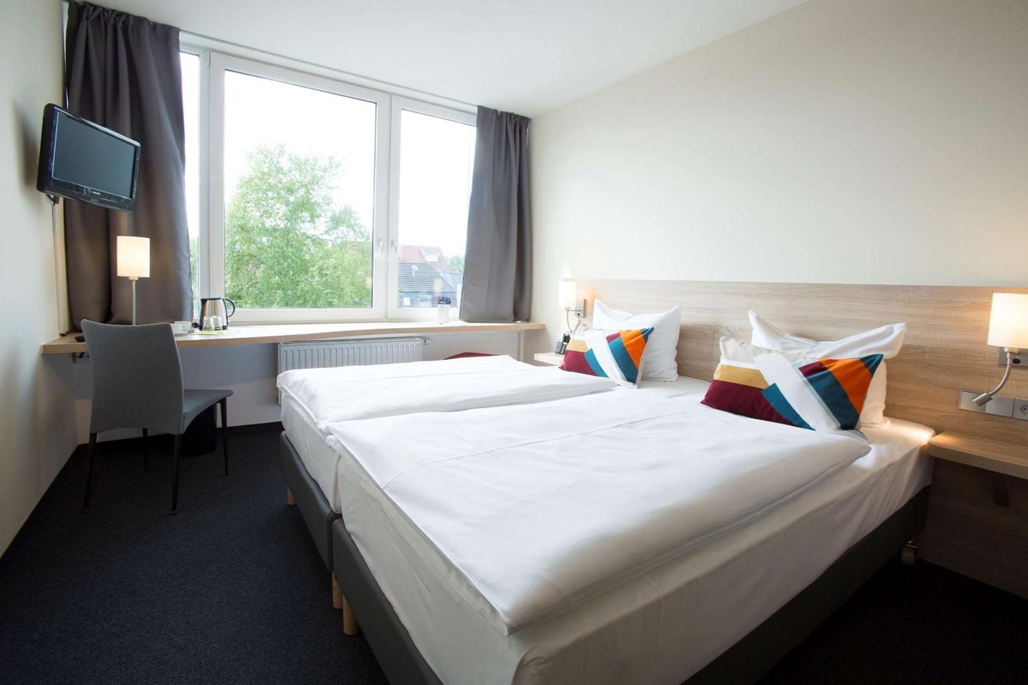 Tweepersoonskamer met 1 of 2 Bedden en Uitzicht op de Binnenplaats