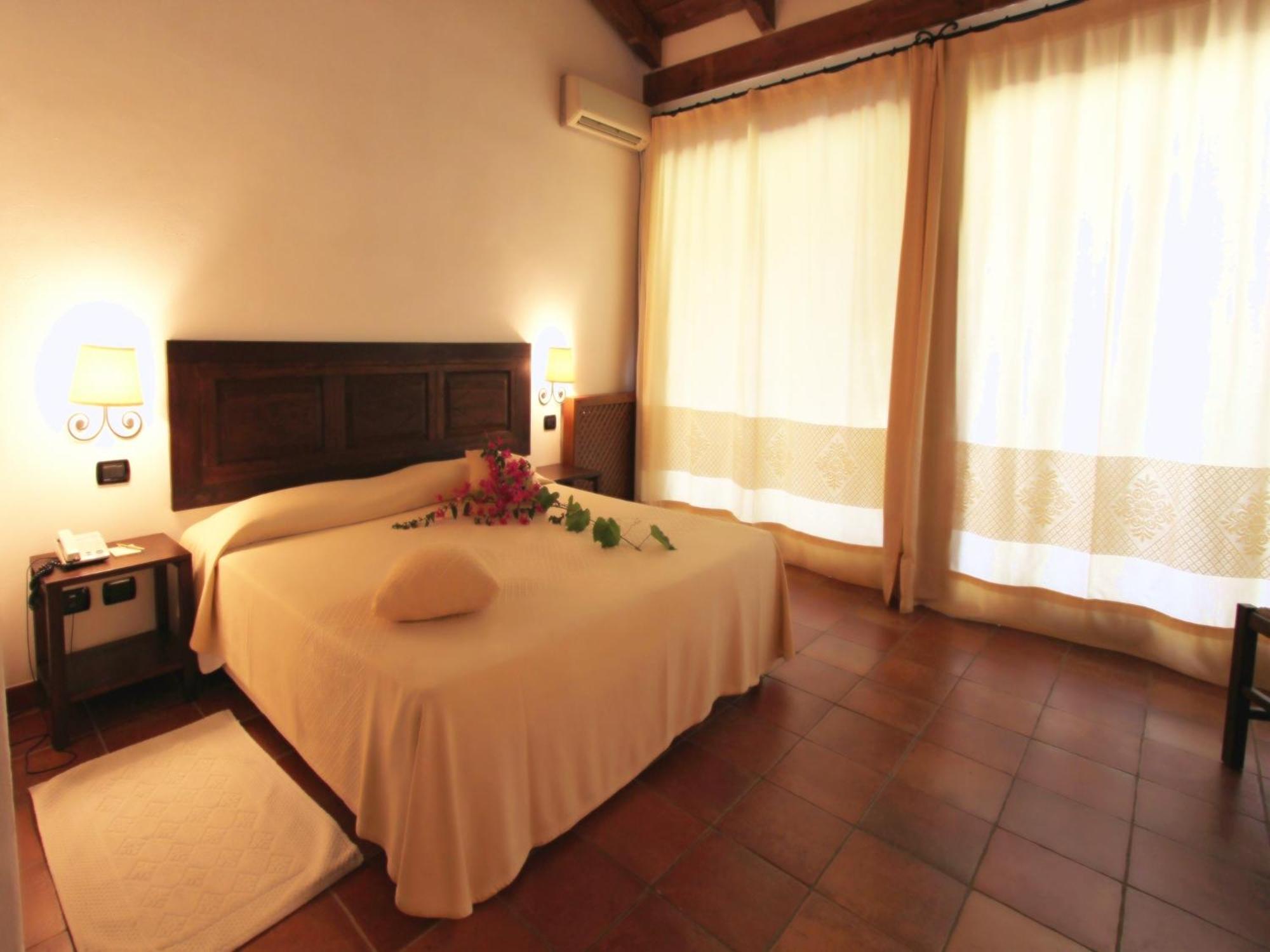 Habitación Triple Clásica (2 adultos + 1 niño)