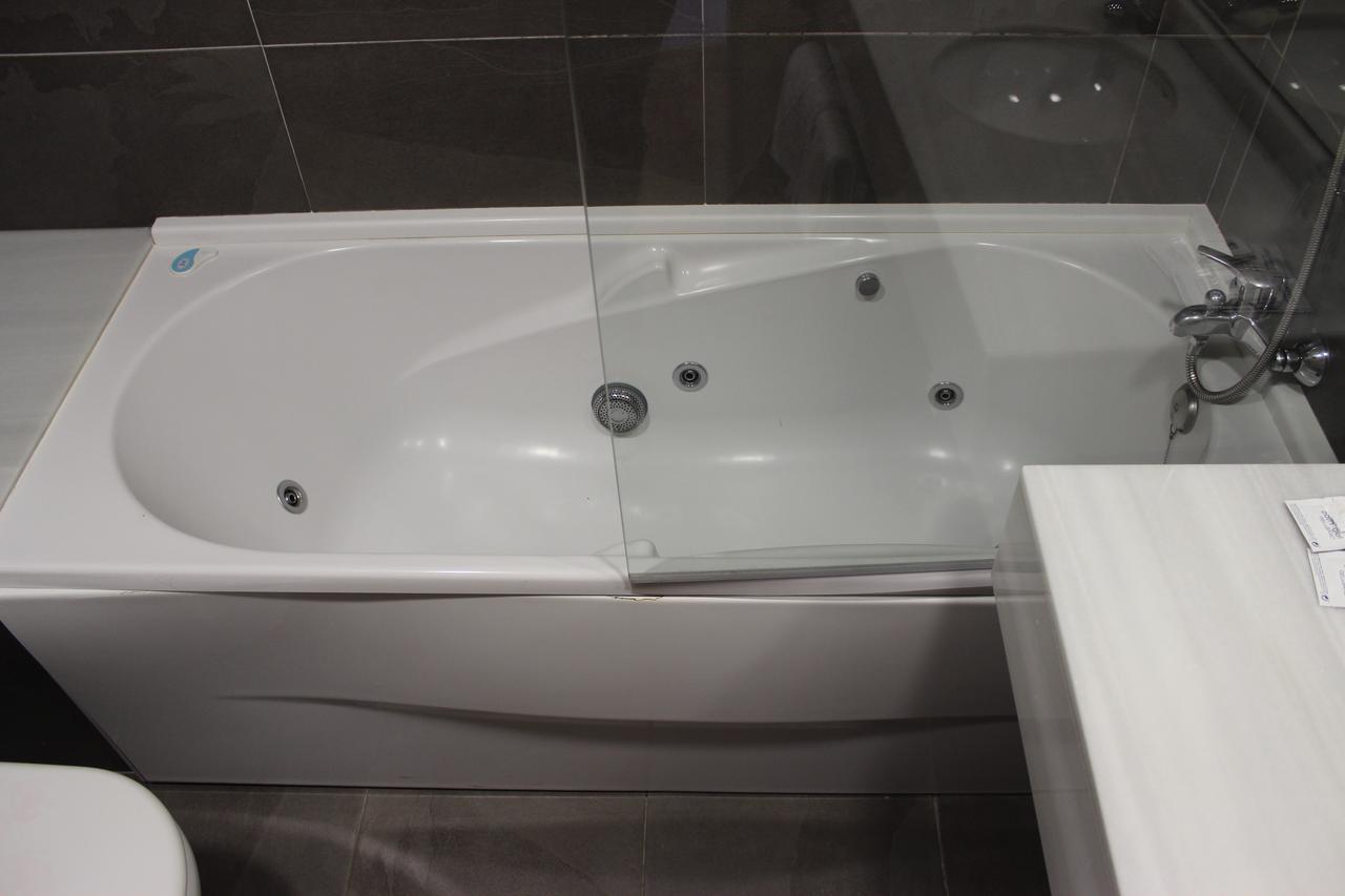Tweepersoonskamer met 1 of 2 Aparte Bedden met Uitzicht op Zee en Bubbelbad