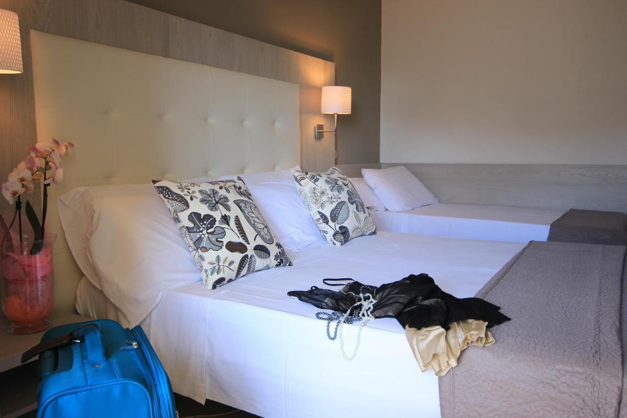 Camera Tripla con Balcone