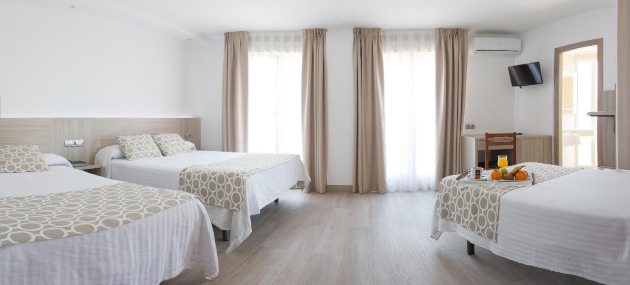 Quadruple Room (2 Adults + 2 Children)