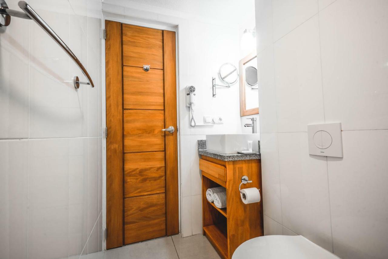 Kamer met Kingsize Bed en Kitchenette - Uitzicht op de Buurt