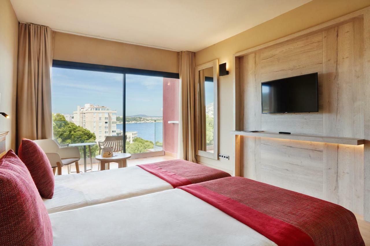 Tweepersoonskamer met Balkon - Gedeeltelijk Uitzicht op Zee (2 Volwassenen + 1 Kind)