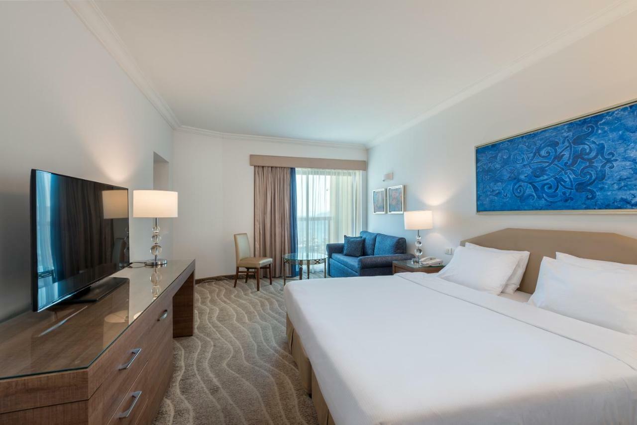 Deluxe Zimmer mit französischem Balkon (2 Erwachsene + 1 Kind)