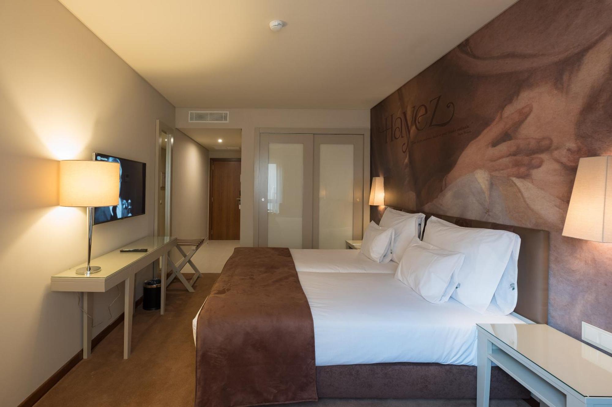 Habitación Doble con cama supletoria (2 adultos + 1 niño) - 2 camas