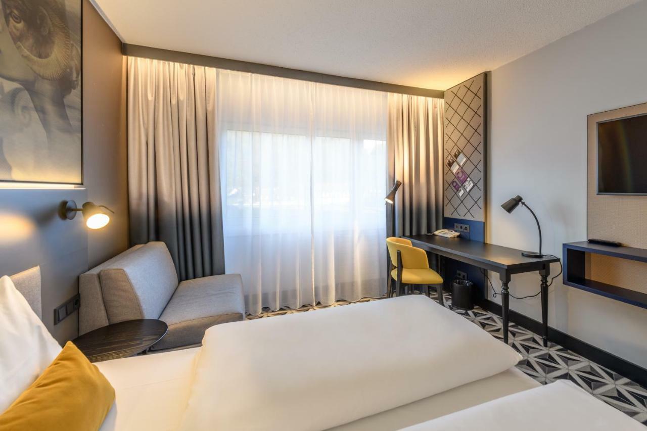 Standard Room with Double and Armchair Bed