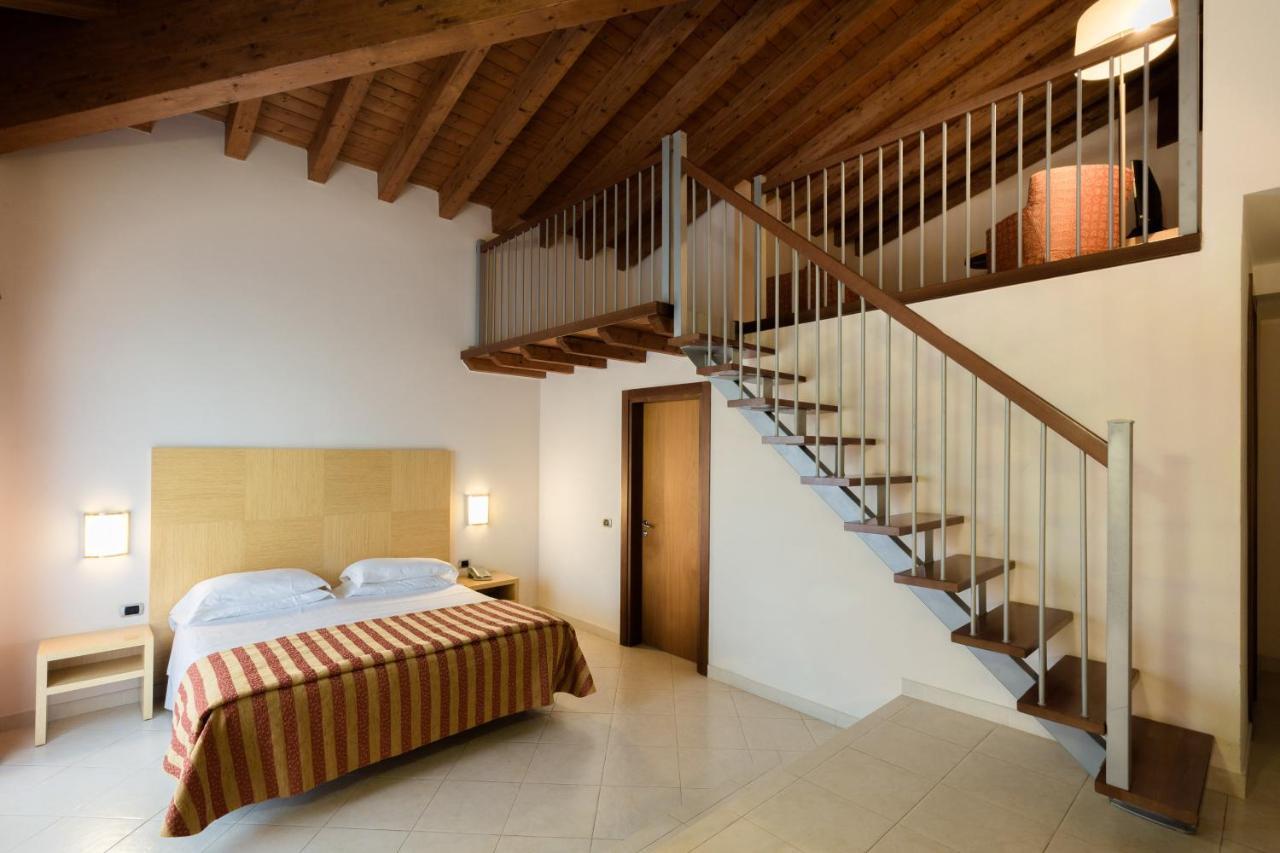 Junior Suite für Familien mit Gartenblick und Zugang zum Spa
