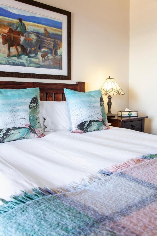 Kamer met Queensize Bed en Uitzicht op Zee