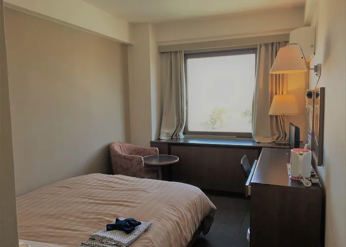 Kanku Sun Plus Yutaka Izumisano