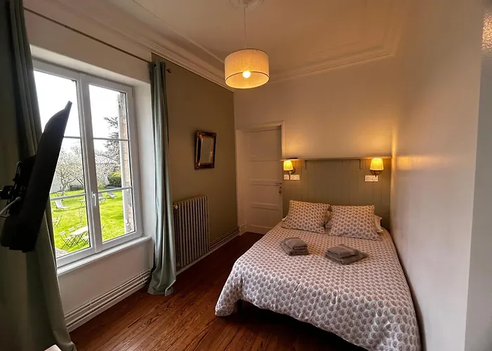 Les chambres d'Omaha Beach Etablissement avec deux chambres d'hôtes, petit-déjeuner compris fait-maison et produits locaux